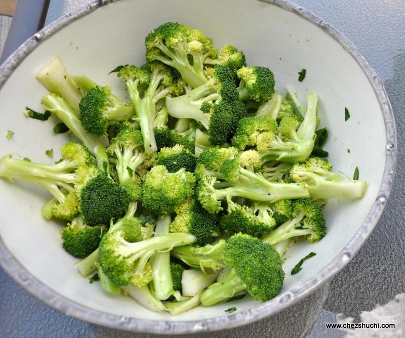 broccoli florets voated in olive oil 