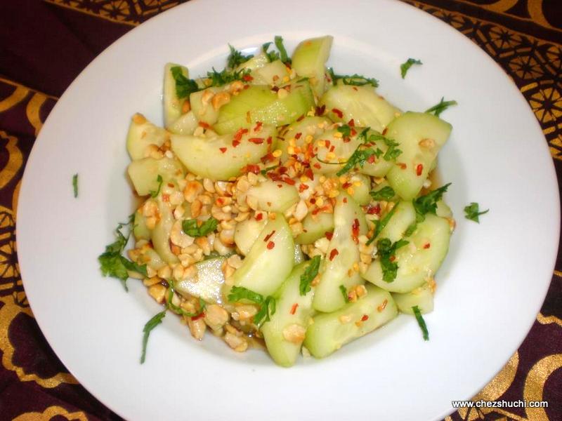 cucumber salad with sweet chili dressing and roasted peanuts